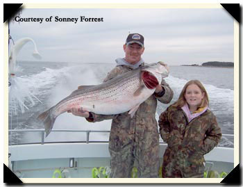 Kelly Manning and her striped bass 